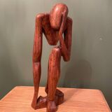 Wooden sculpture inspired by Rodin's "The Thinker"