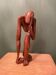 Wooden sculpture inspired by Rodin's "The Thinker"