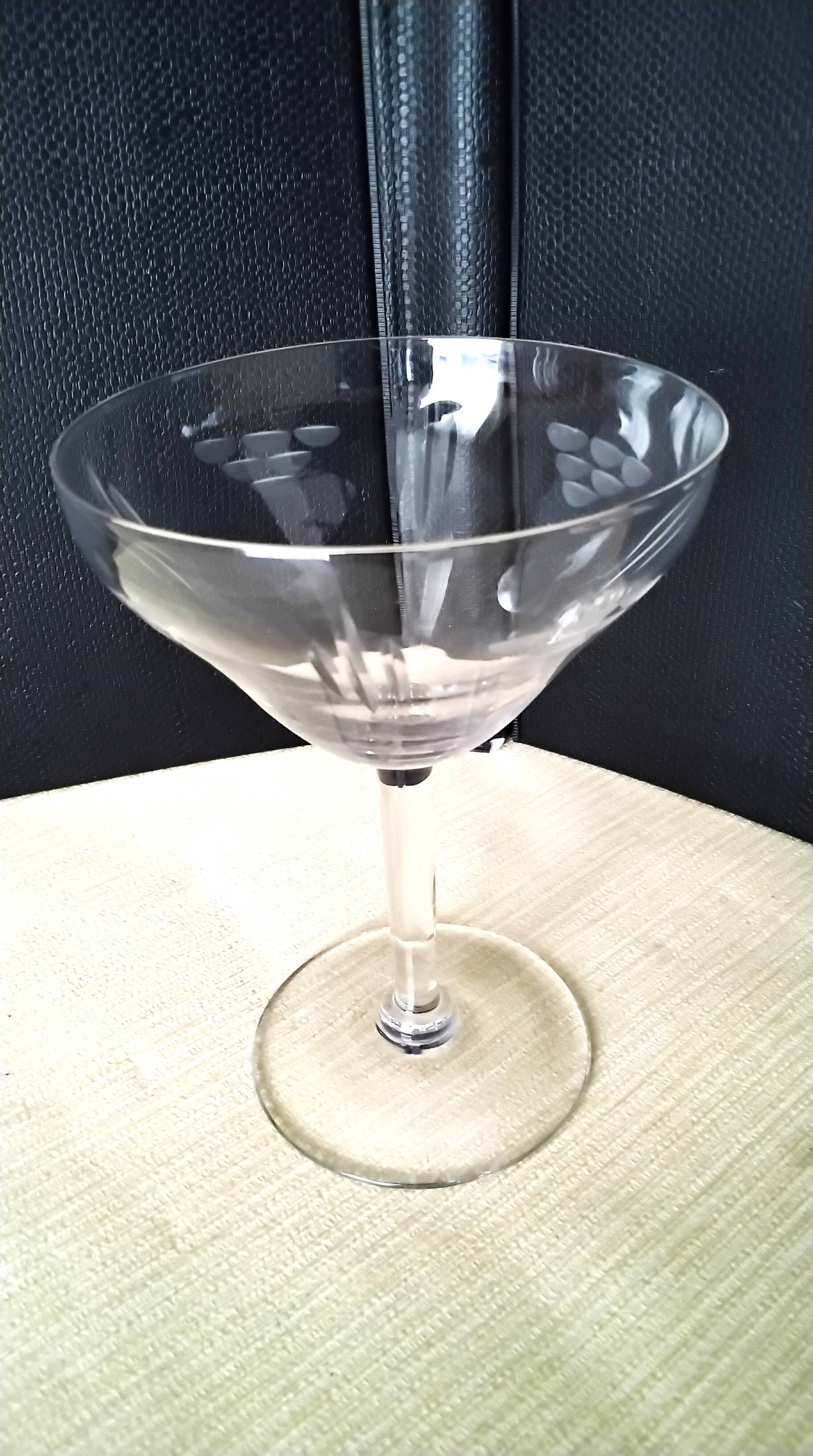 5 Vintage glass champagne coupes with engraved decoration