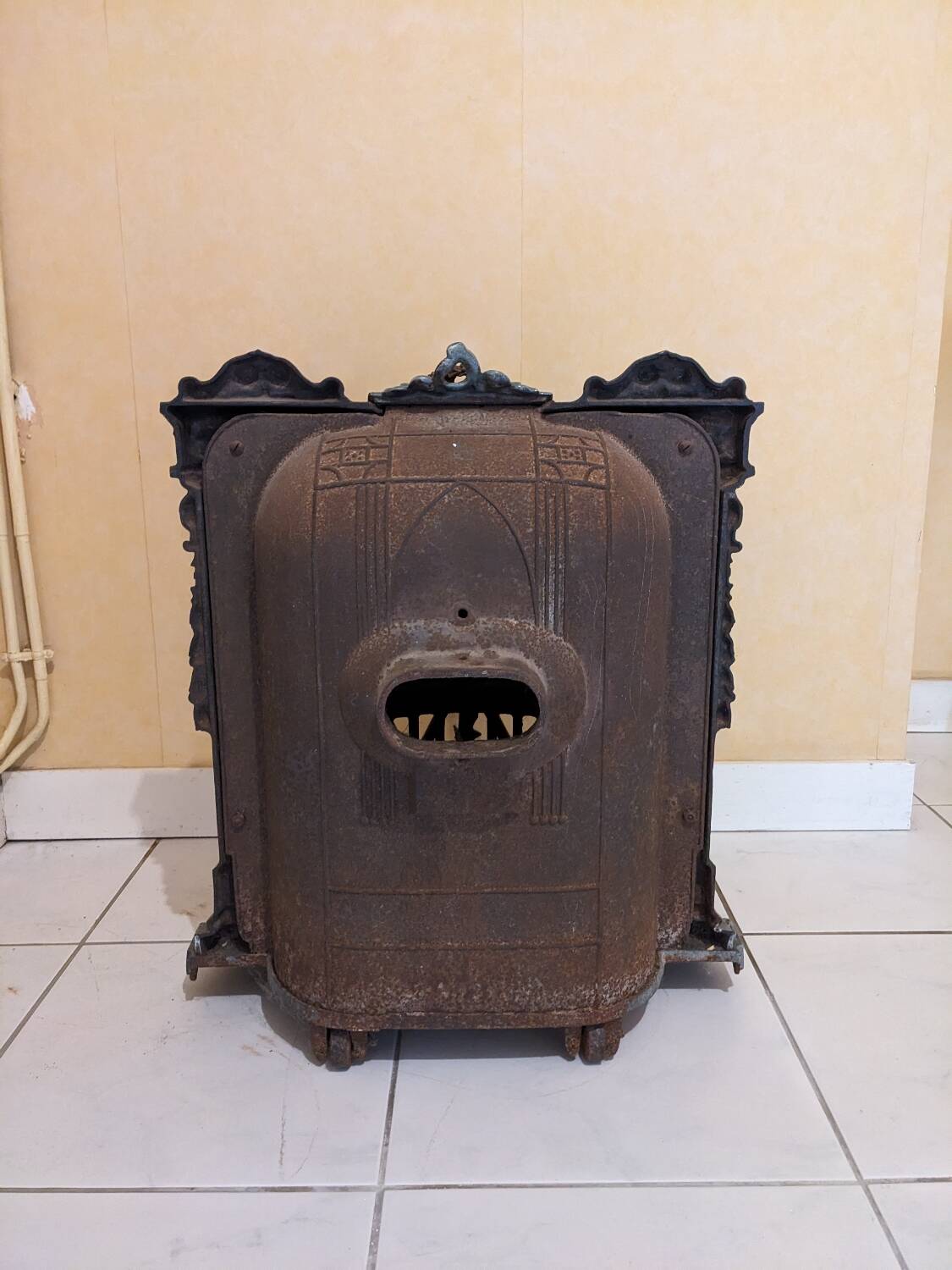 Mobile cast iron stove model "la chatte" designed by the French engineer Edmond Chaboche in 1883