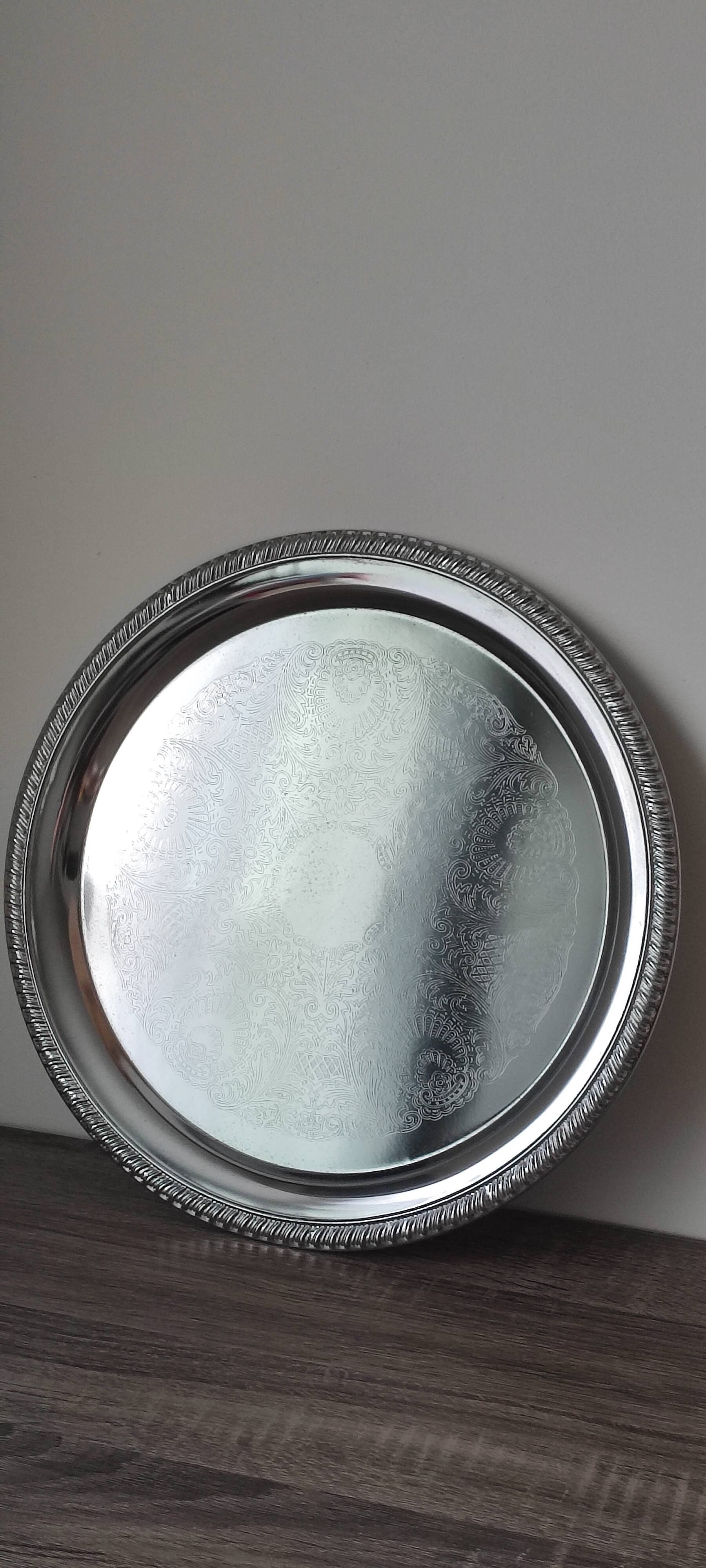 Silver-plated metal dish with a 1980s pattern