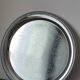 Silver-plated metal dish with a 1980s pattern