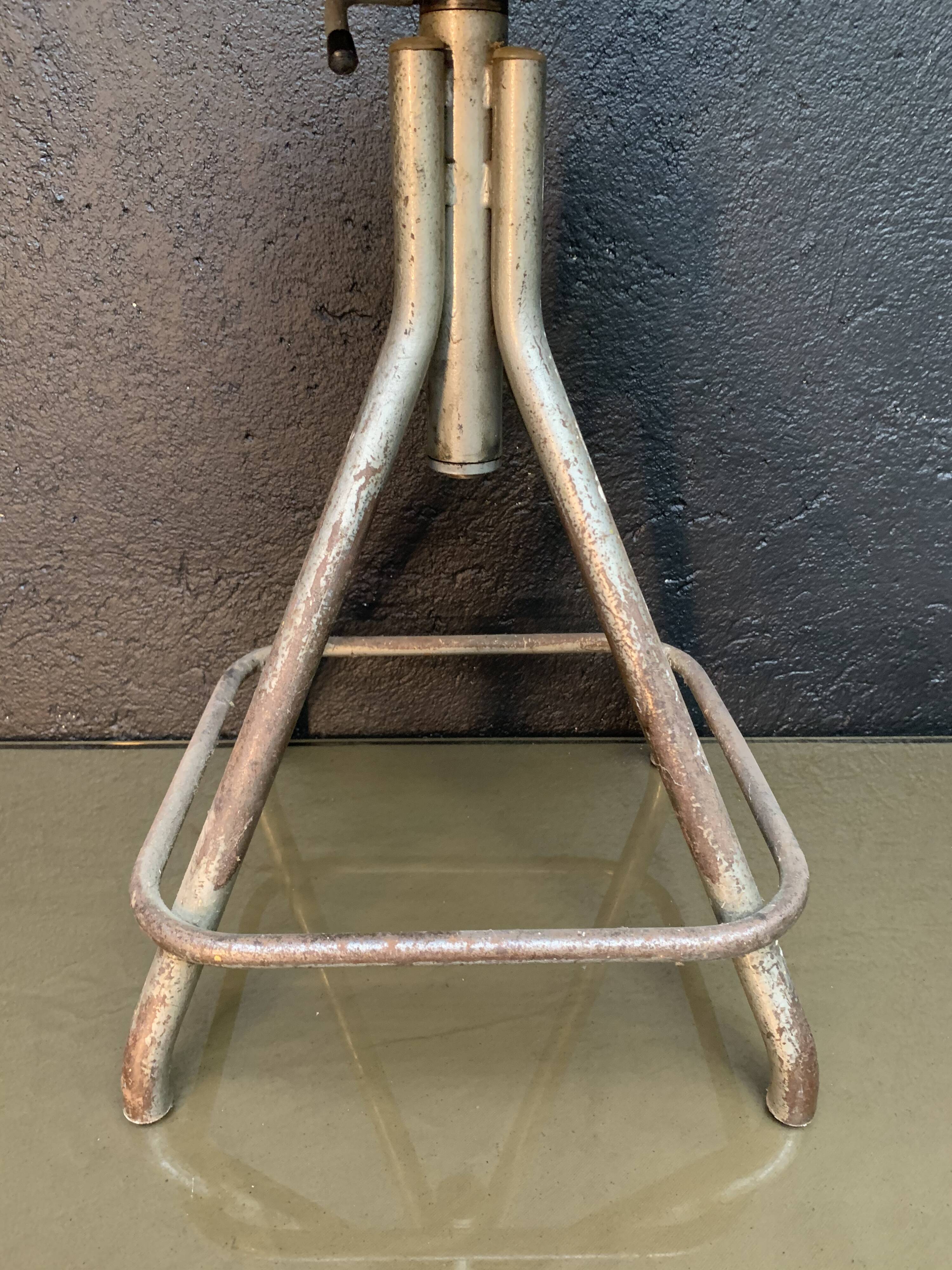 Old adjustable workshop stool