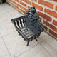 Antique black cast iron log cradle in rococo style