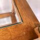 Classic wooden shelves, glass tops and cannage