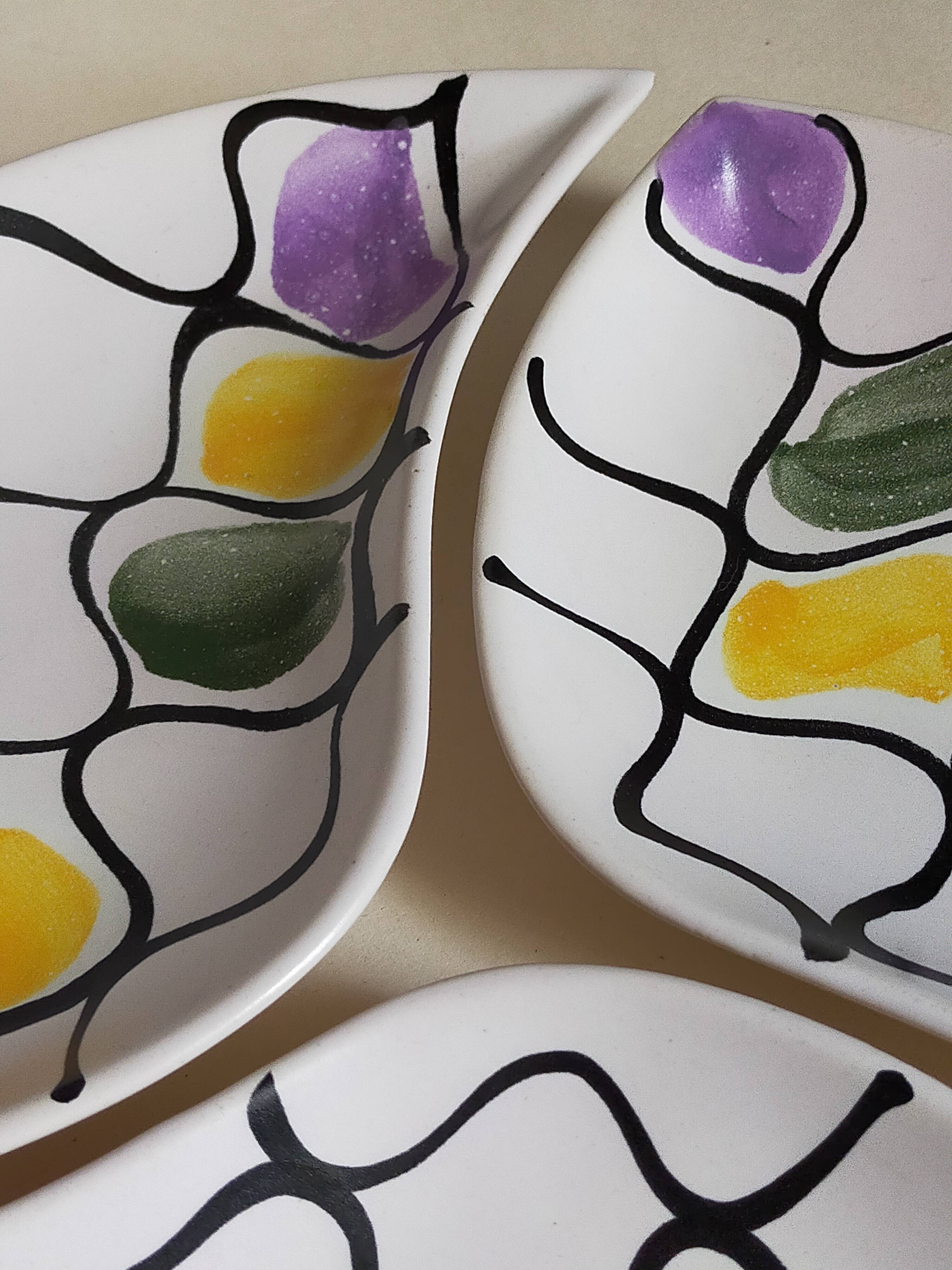 Three vintage free-form ceramic ravine dishes from the 1950s