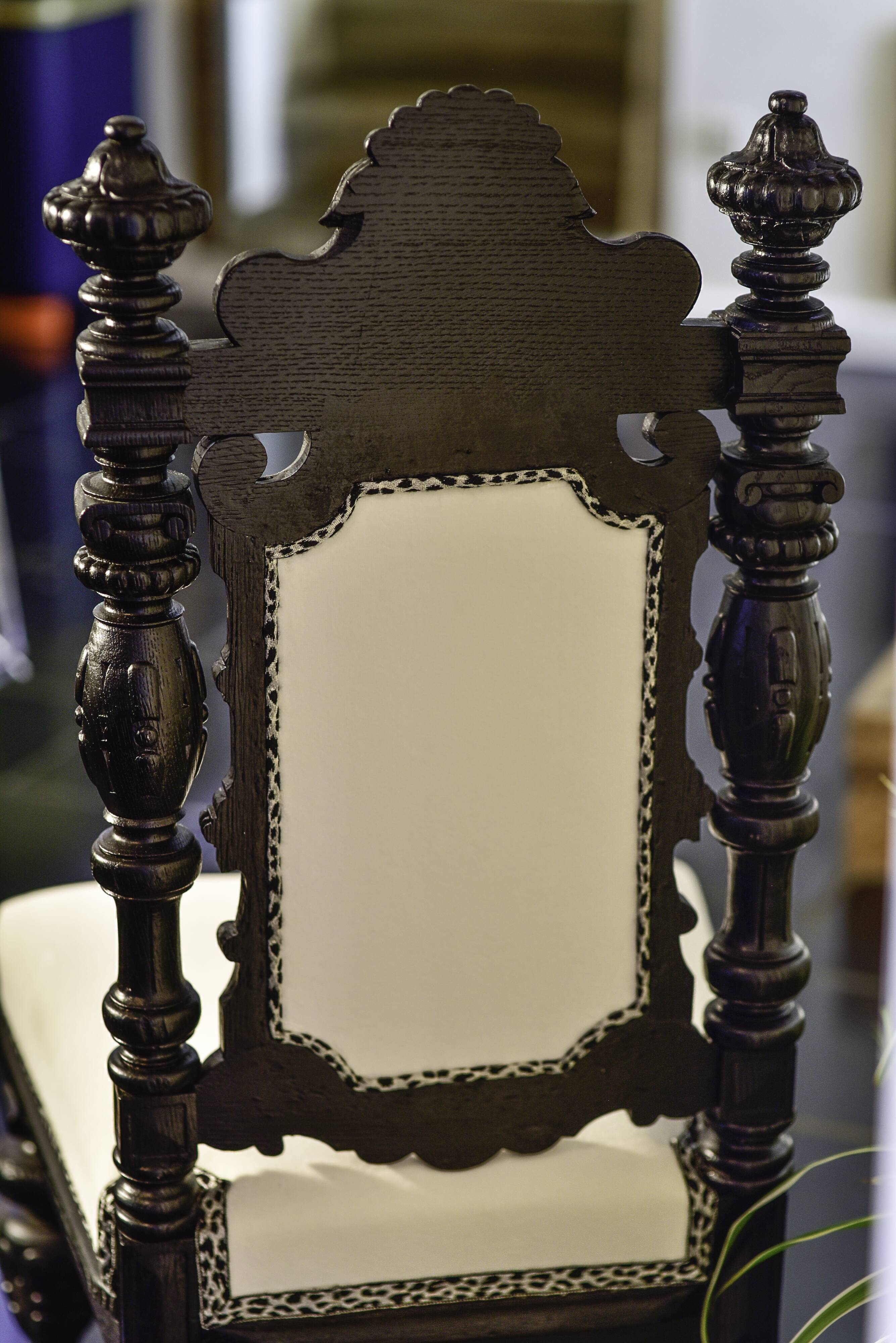 Classic black and white wooden throne