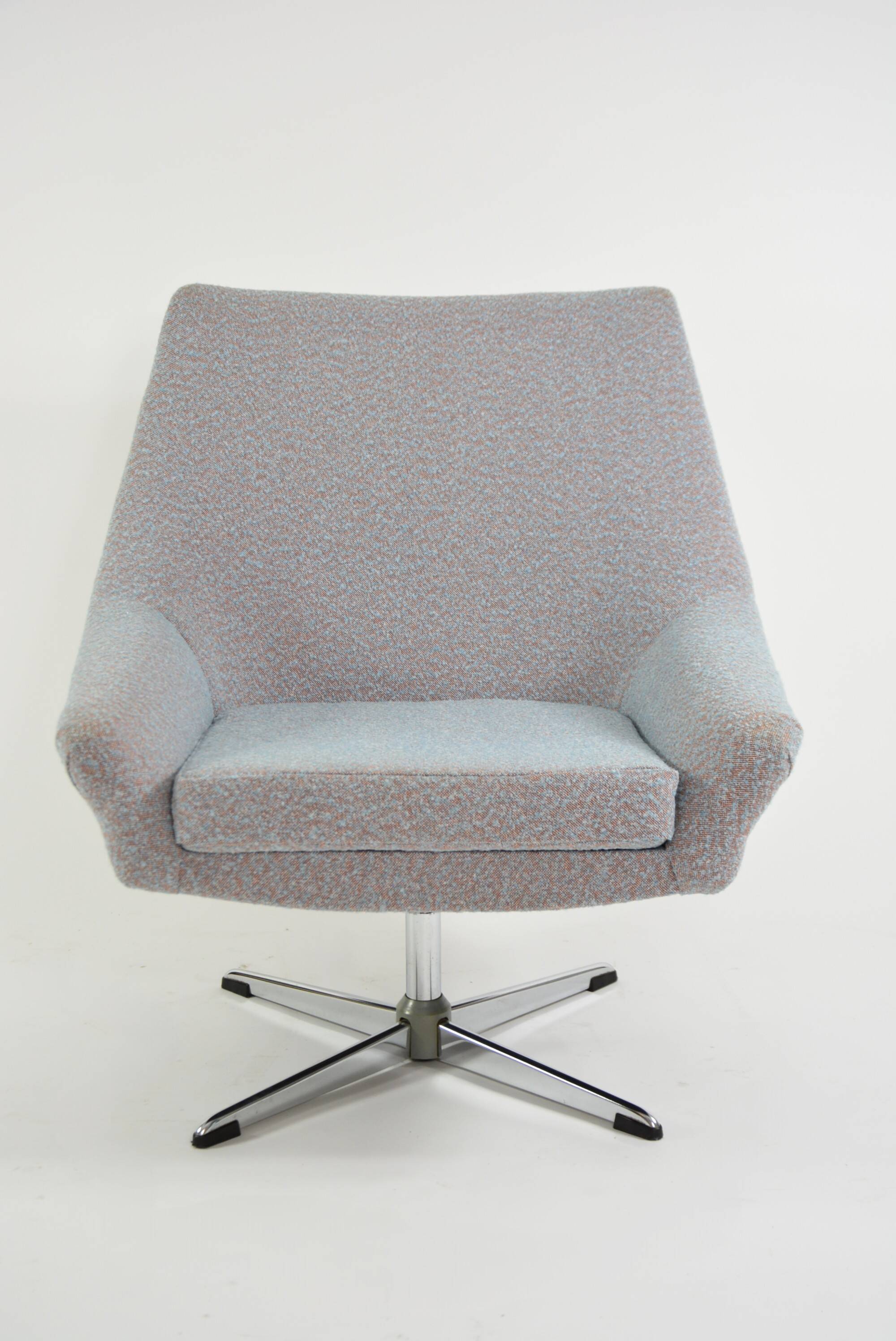Modernist shell armchairs from the 1970s.