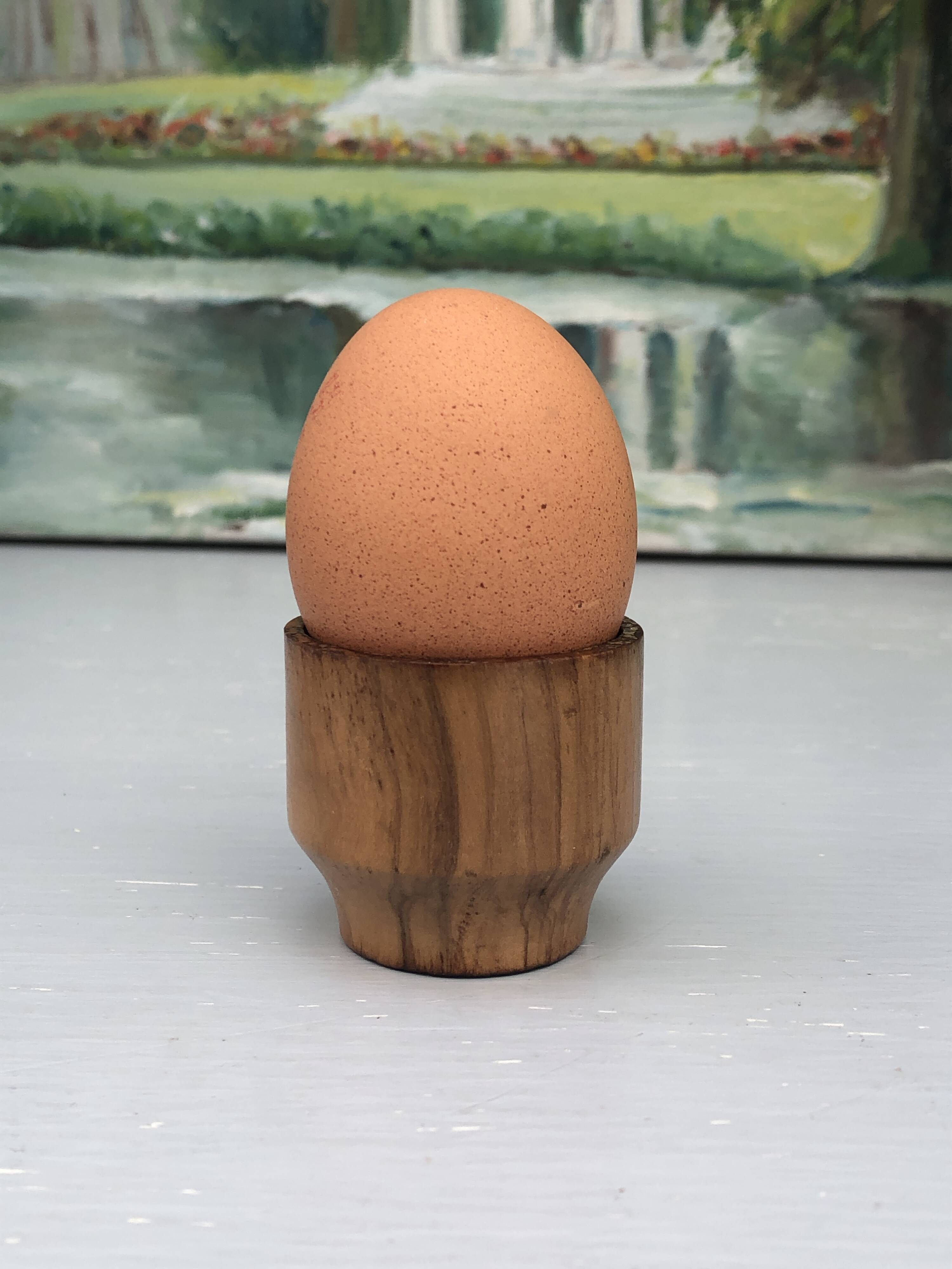 Five olive wood egg cups