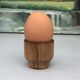 Five olive wood egg cups
