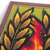 Framed tapestry of island birds