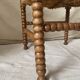 Corner chair in straw and turned wood, fireside chair.