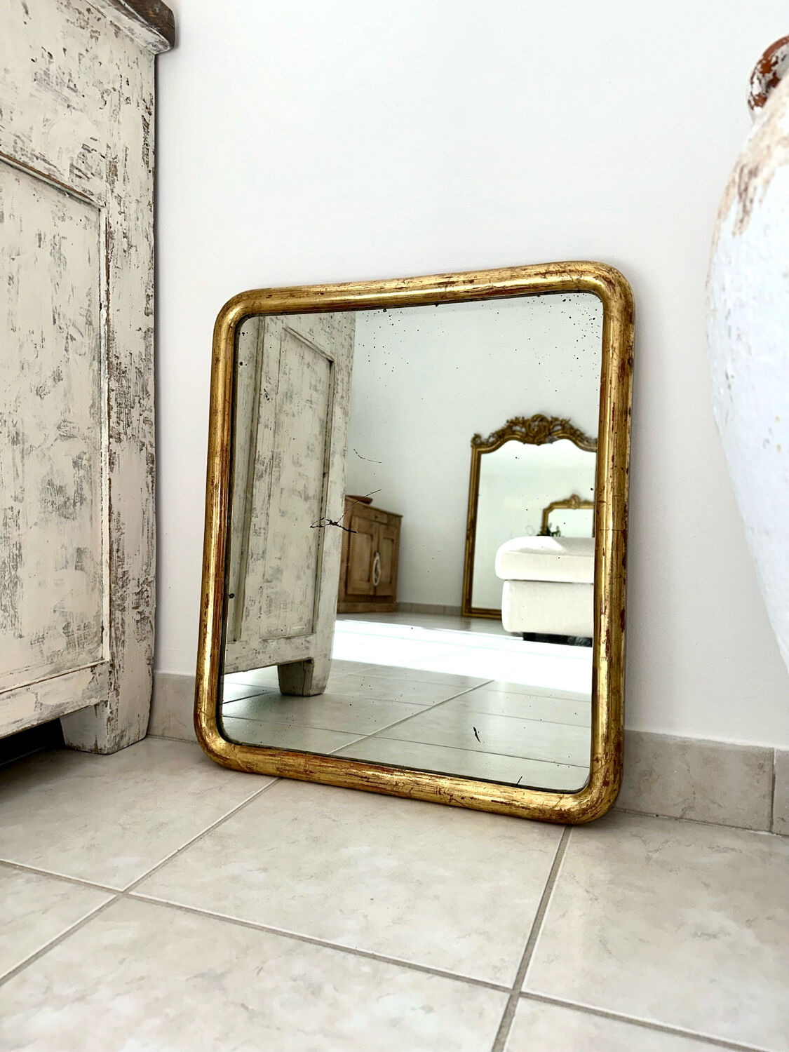 Antique gilded Louis-Philippe mirror, 19th century.