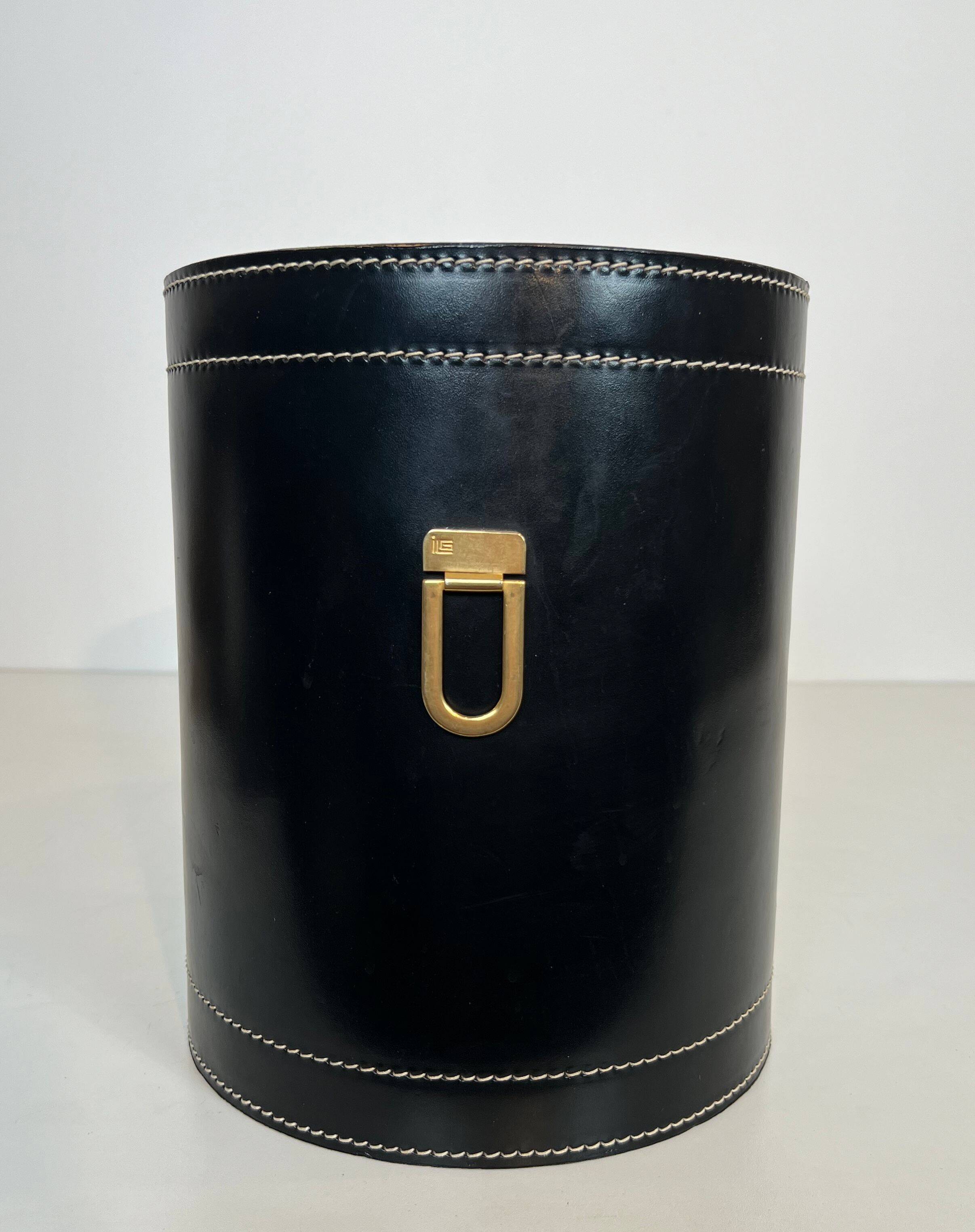 Black leather and brass desk basket