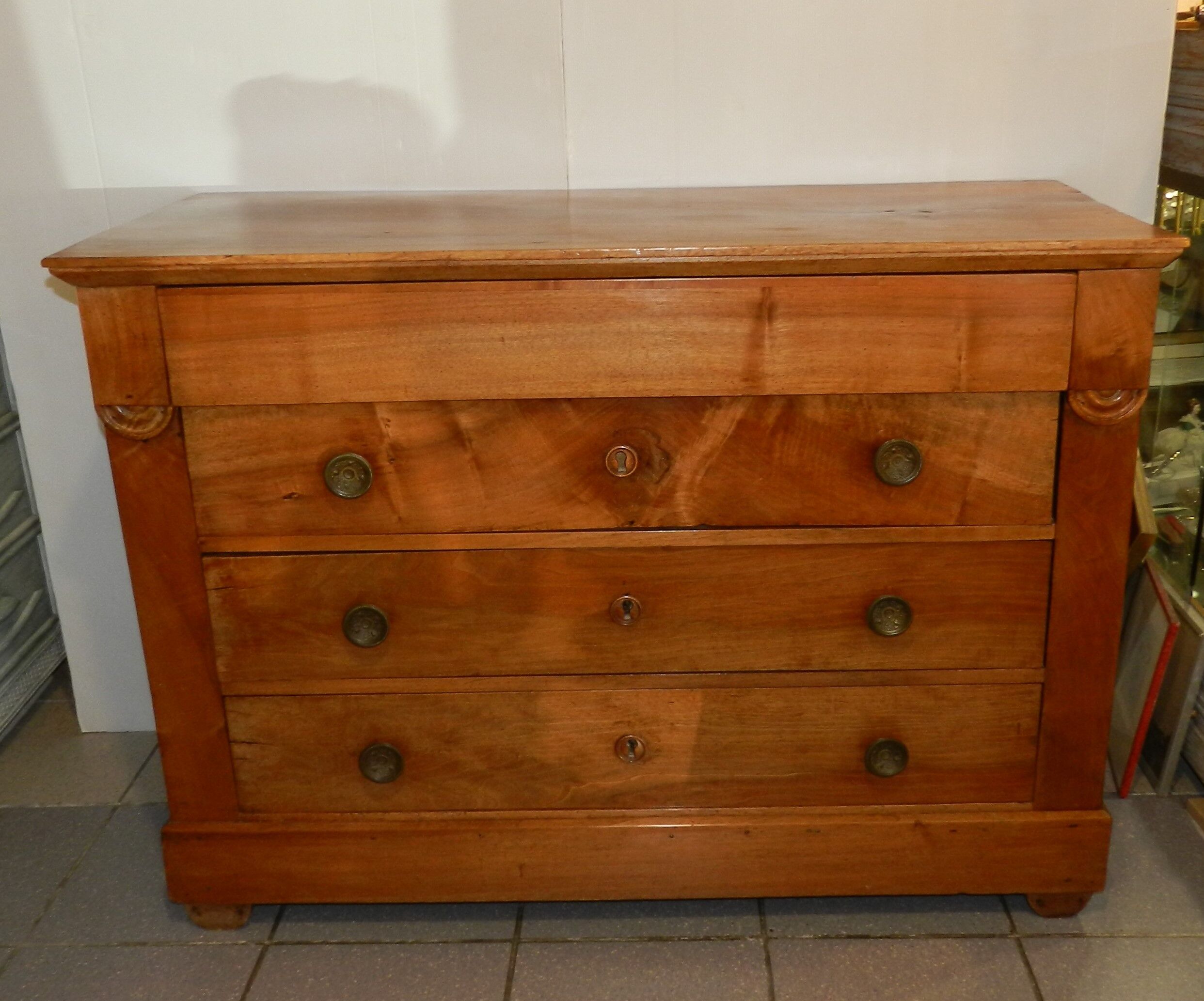 Empire style chest of drawers in blond walnut