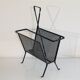 Magazine holder by Mathieu Mategot