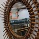 Starry sun mirror in rattan, France around 1960.