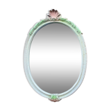 Vintage oval mirror in carved wood in pastel tones
