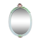 Vintage oval mirror in carved wood in pastel tones