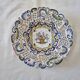 Decorative plate in Rouen earthenware, 19th century