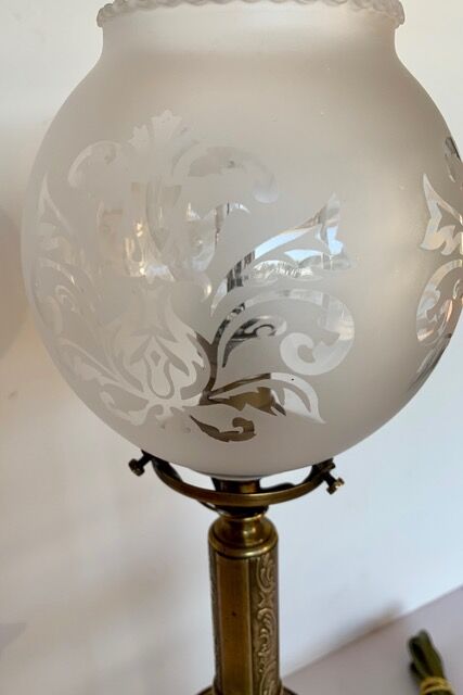 Ancient lamp on foot