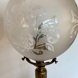 Ancient lamp on foot