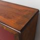 Scandinavian sideboard in dark red wood and leather, 1960s vintage modernism