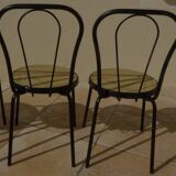 4 Chaises bistrot en métal noir et assise cannage plastique