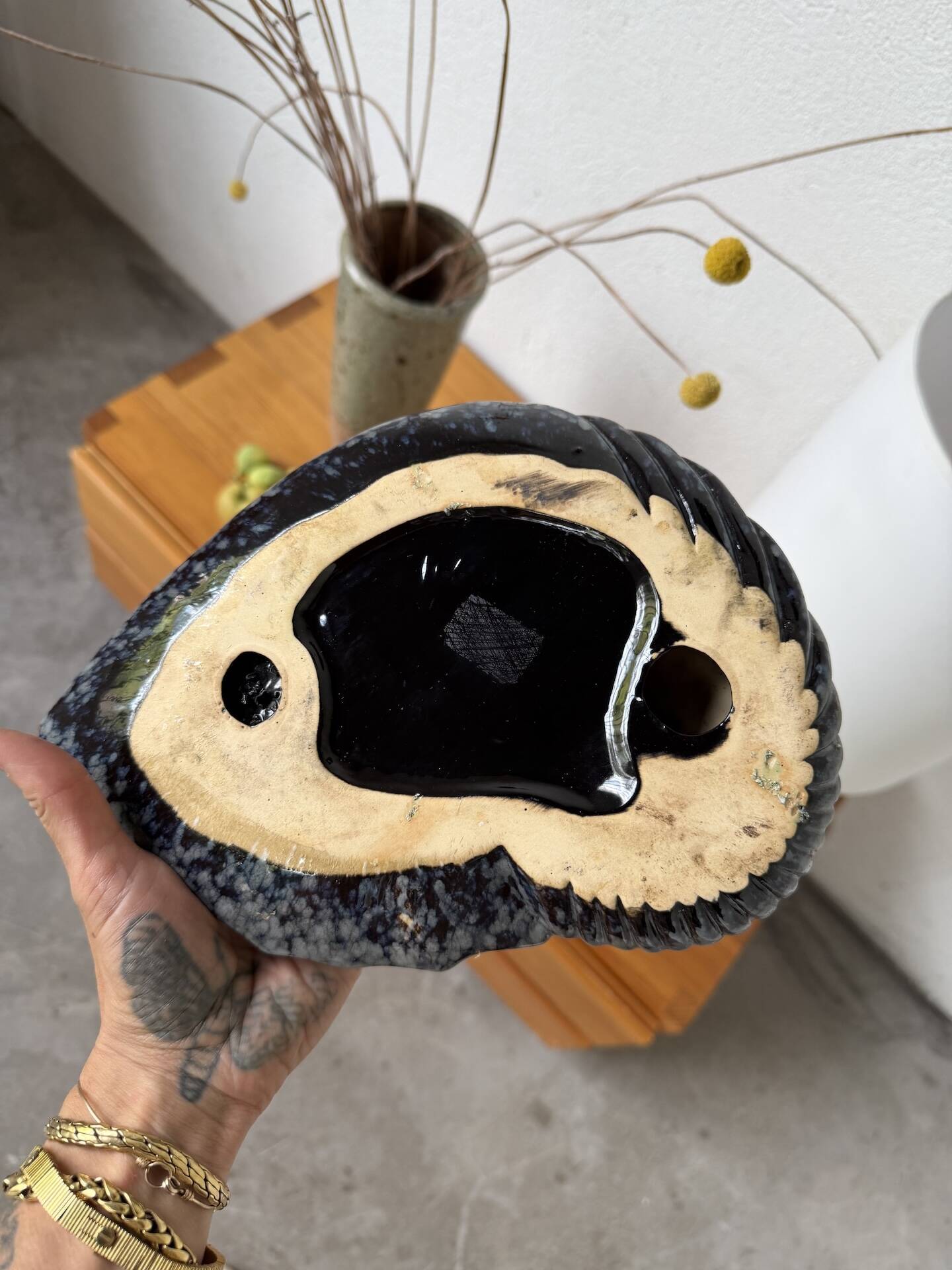 Shell-shaped ceramic catchall.