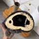 Shell-shaped ceramic catchall.