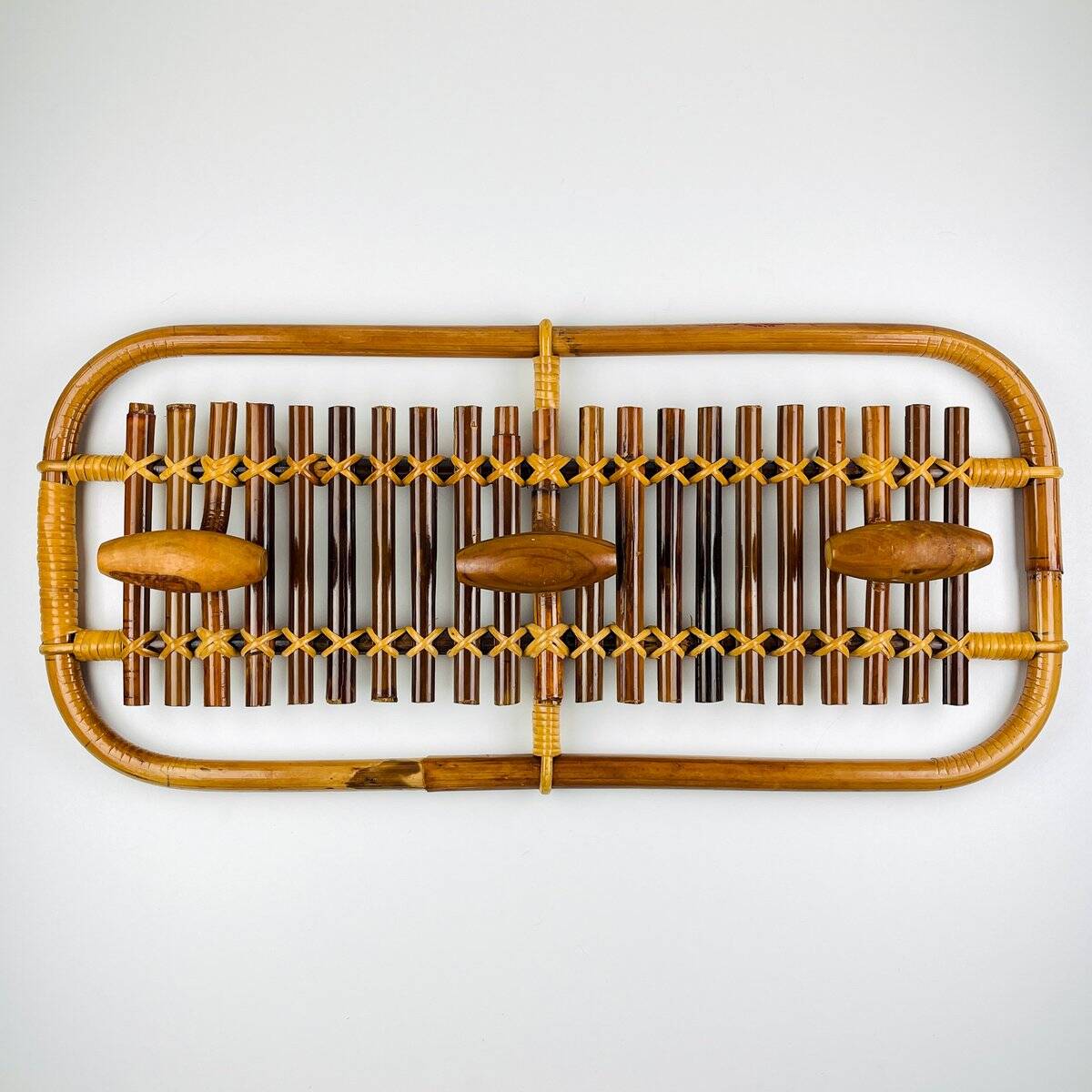 Bamboo and rattan coat rack in mid-century style attributed to Olaf Von Bohr, Italy, 1950s.