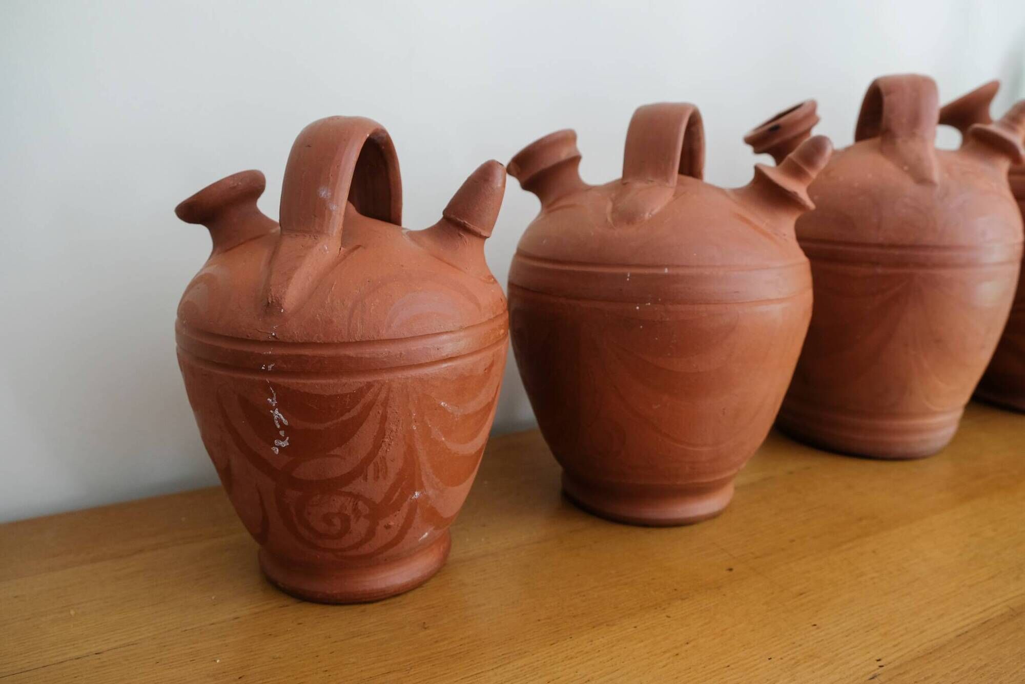 Set of 4 terracotta jugs