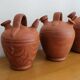Set of 4 terracotta jugs