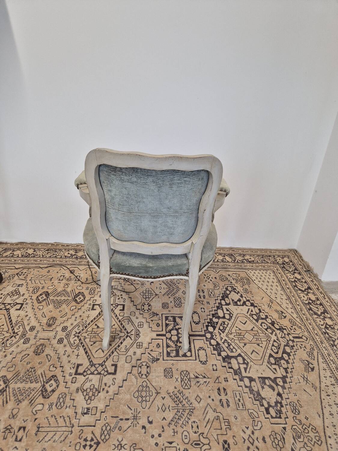 Louis XV style cabriolet armchair in patinated wood and velvet