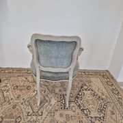 Louis XV style cabriolet armchair in patinated wood and velvet