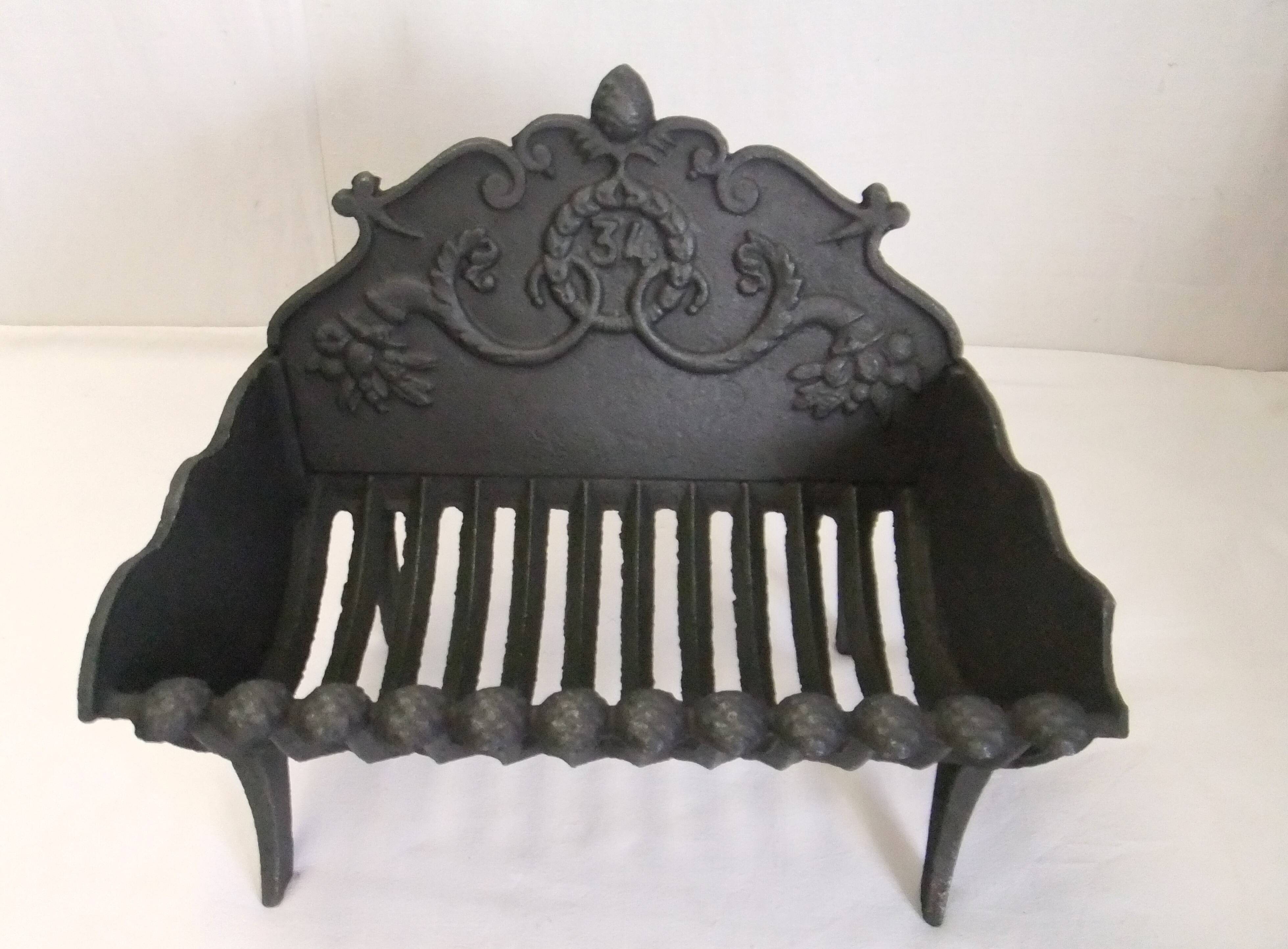 Old cast iron log holder andiron fireplace cornucopia pine cone
