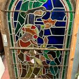 Stained glass panel representing a nineteenth century coronation