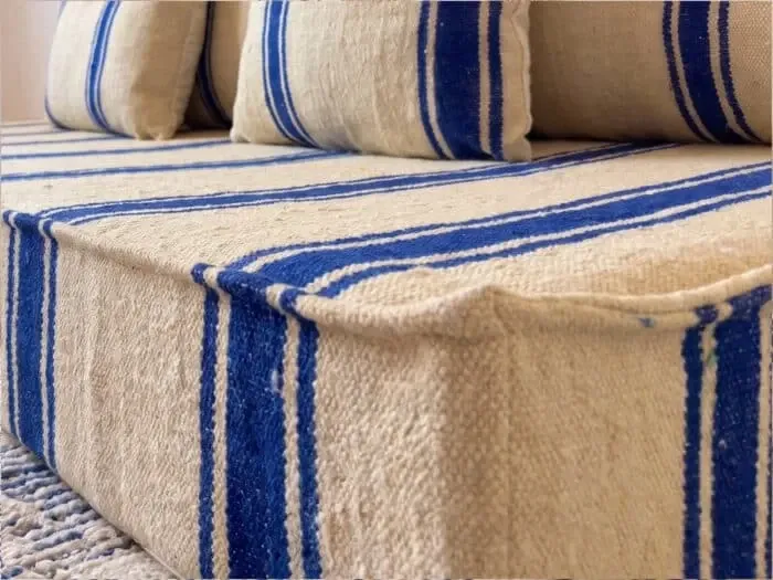 Royal blue striped floor cushion – Hanbel in handwoven ivory wool
