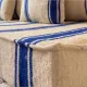 Royal blue striped floor cushion – Hanbel in handwoven ivory wool