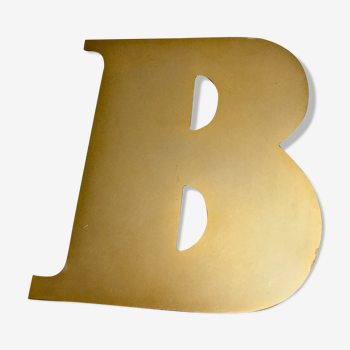 Old golden brass sign letter