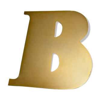 Old golden brass sign letter