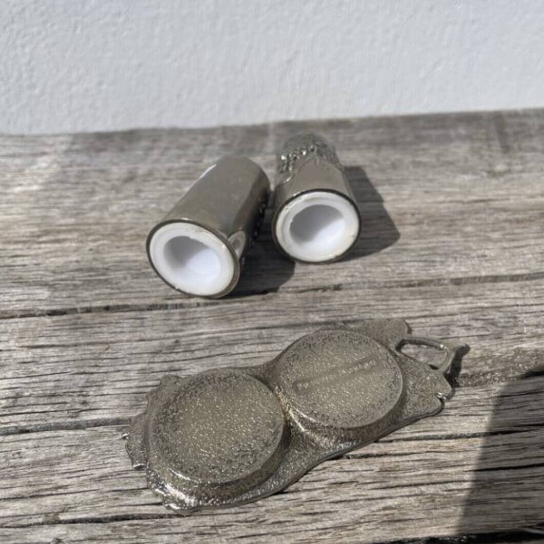 Silver-plated metal vine-shaped salt and pepper shakers