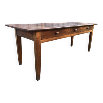 Antique chestnut farmhouse table with 3 drawers on the front.