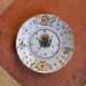 Old plate with coat of arms