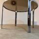 Table ronde vintage tubulaire en métal et verre fumé design année 70