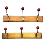 Pair of vintage wooden wall coat racks with three red ball hooks
