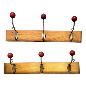 Pair of vintage wooden wall coat racks with three red ball hooks
