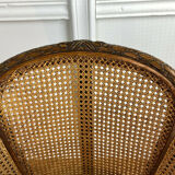 Old armchair with double cannage in walnut carved style Louis XVI of the nineteenth century