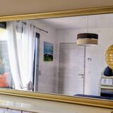 Large golden panoramic mirror