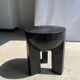 Black mango wood tripod side table with a semi-spherical top, height: 45 cm, diameter: 44 cm.